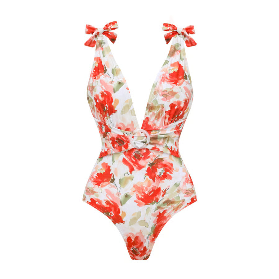 Bañador Rosavelle crudo y rojo con estampado floral, escote en V y falda